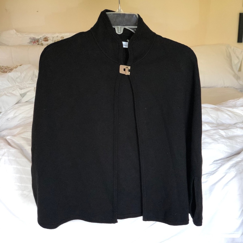 Black Calvin Klein cape with silver turnlock clasp